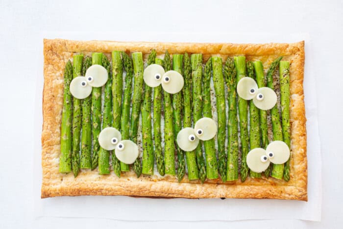Flatbread with cheese, and asparagus