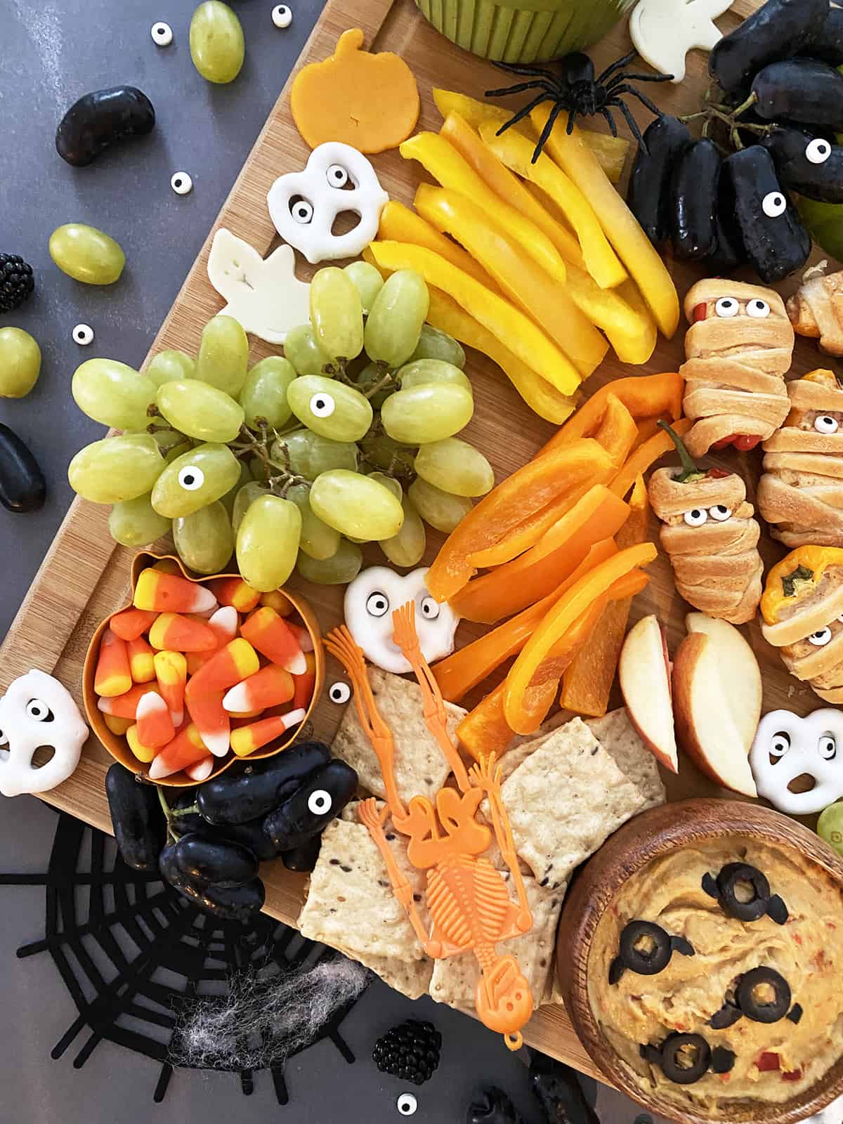 Close-up of Halloween snack board with healthy treats.